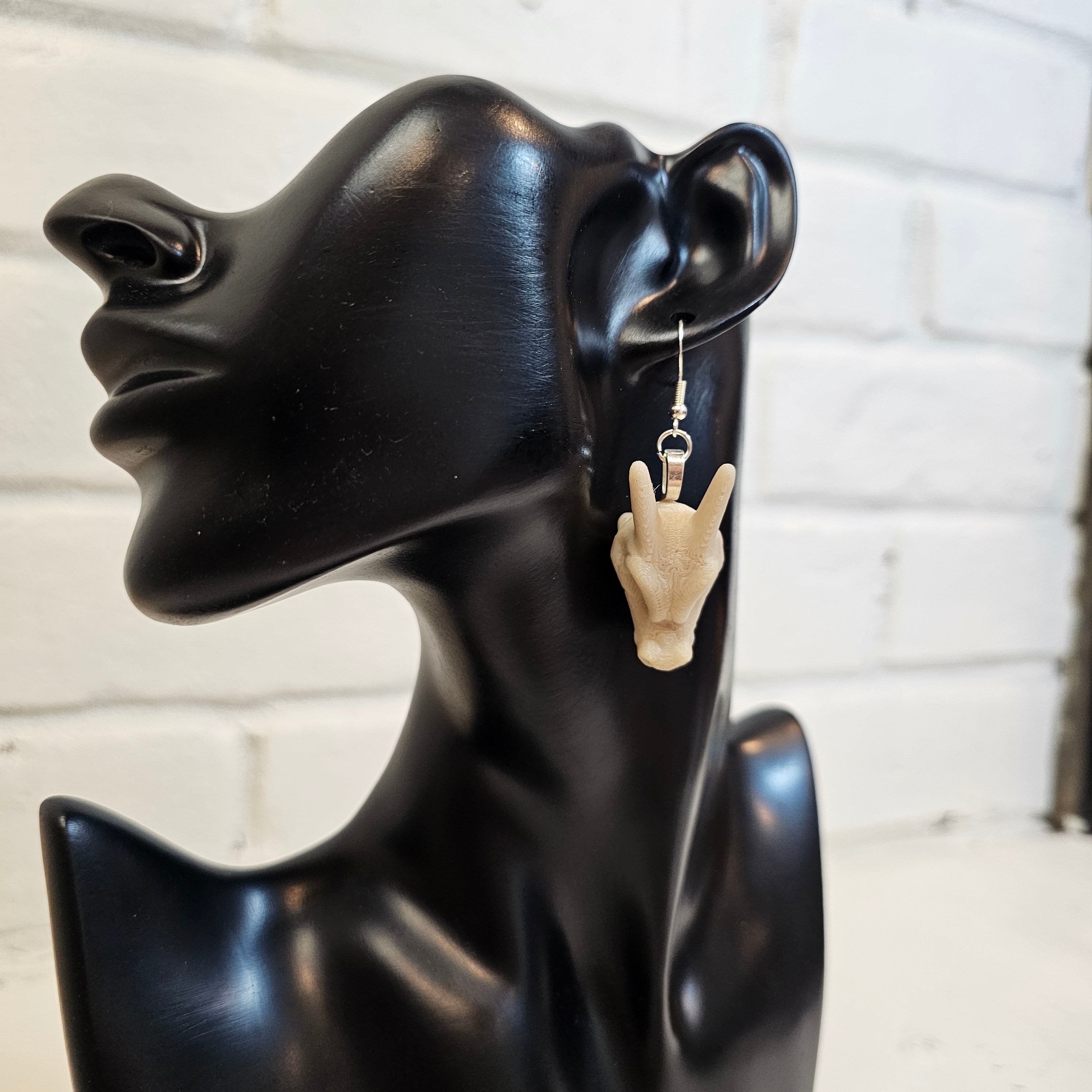 Charizard skull earrings